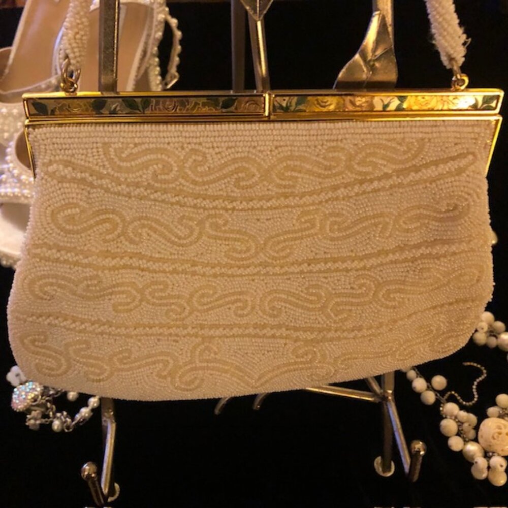 Elegant Cream Clutch with Gold Accents